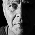 a black and white photo of an older man | ask2axcel